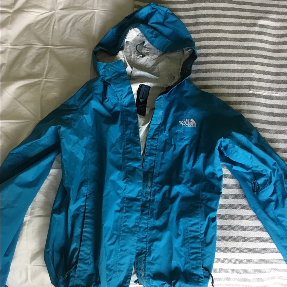 Blue north face rain jacket